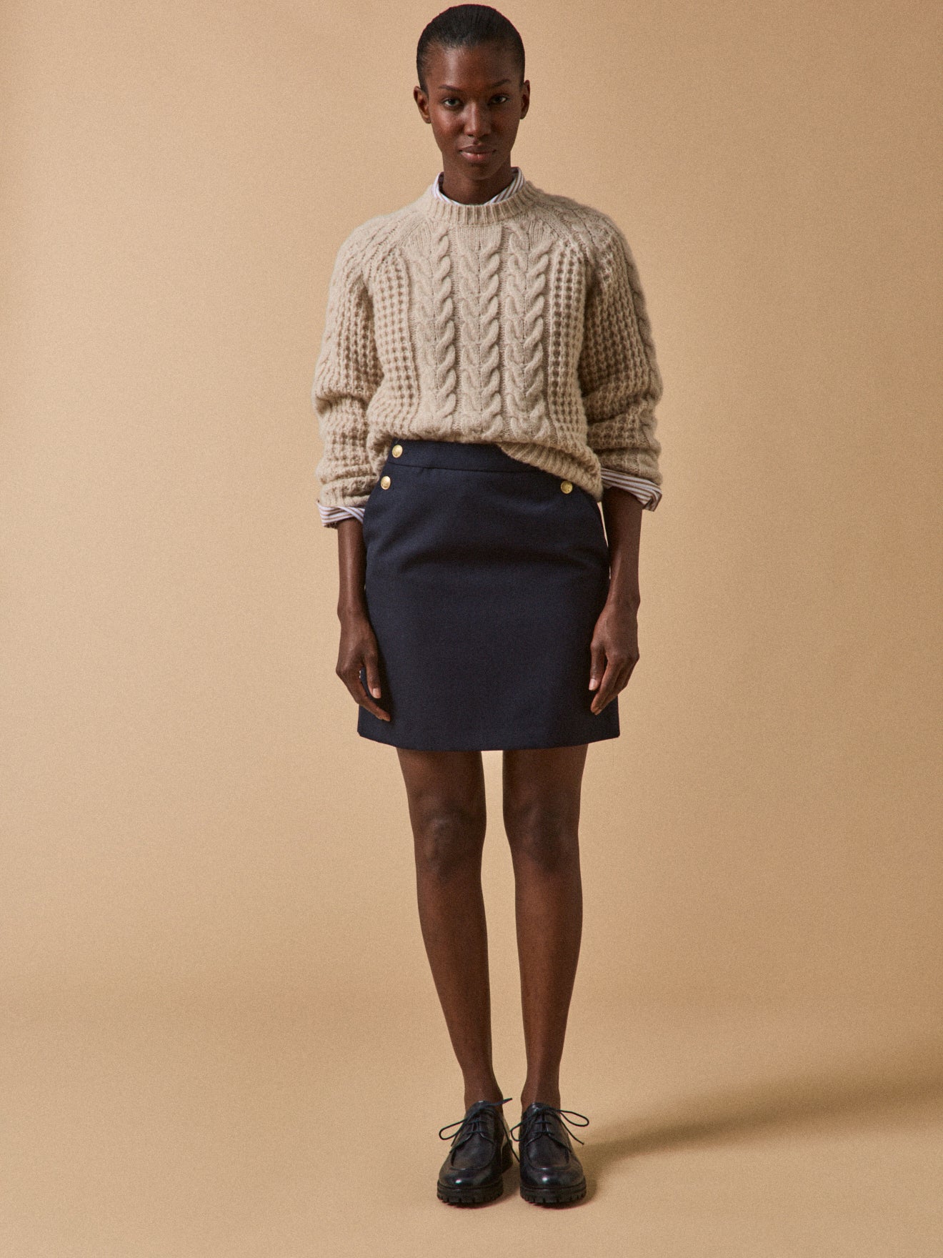 Jupe courte à pont boutons dorés femme