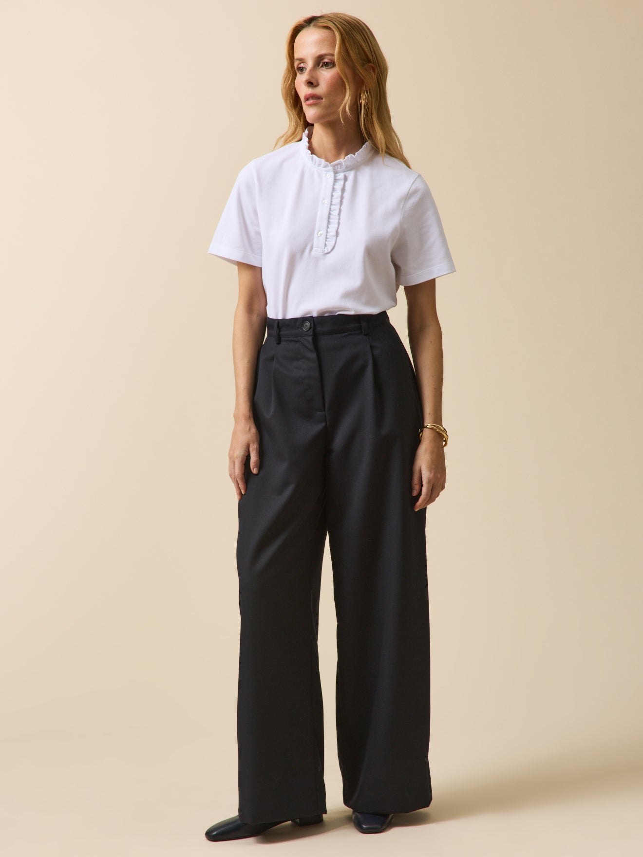 Damen-Poloshirt mit Volants am Kragen