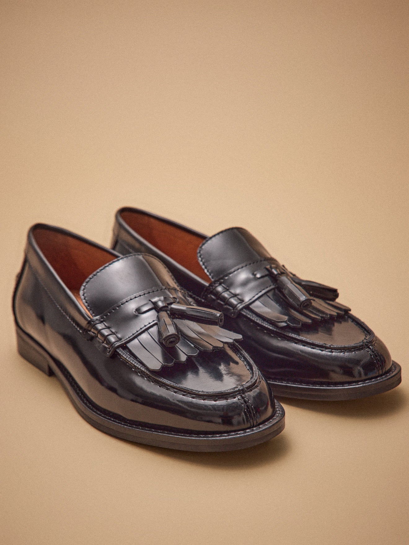 Mocassins frange et pompons cuir femme