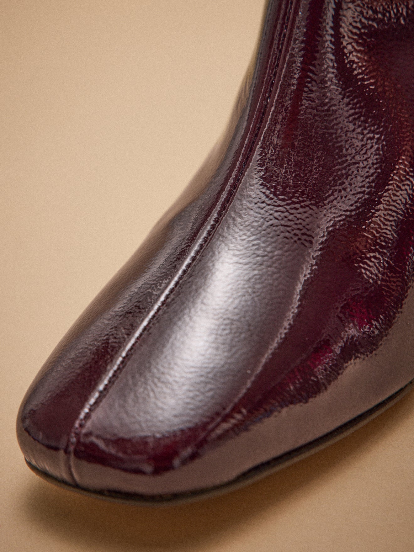 Boots à talon cuir vernis femme