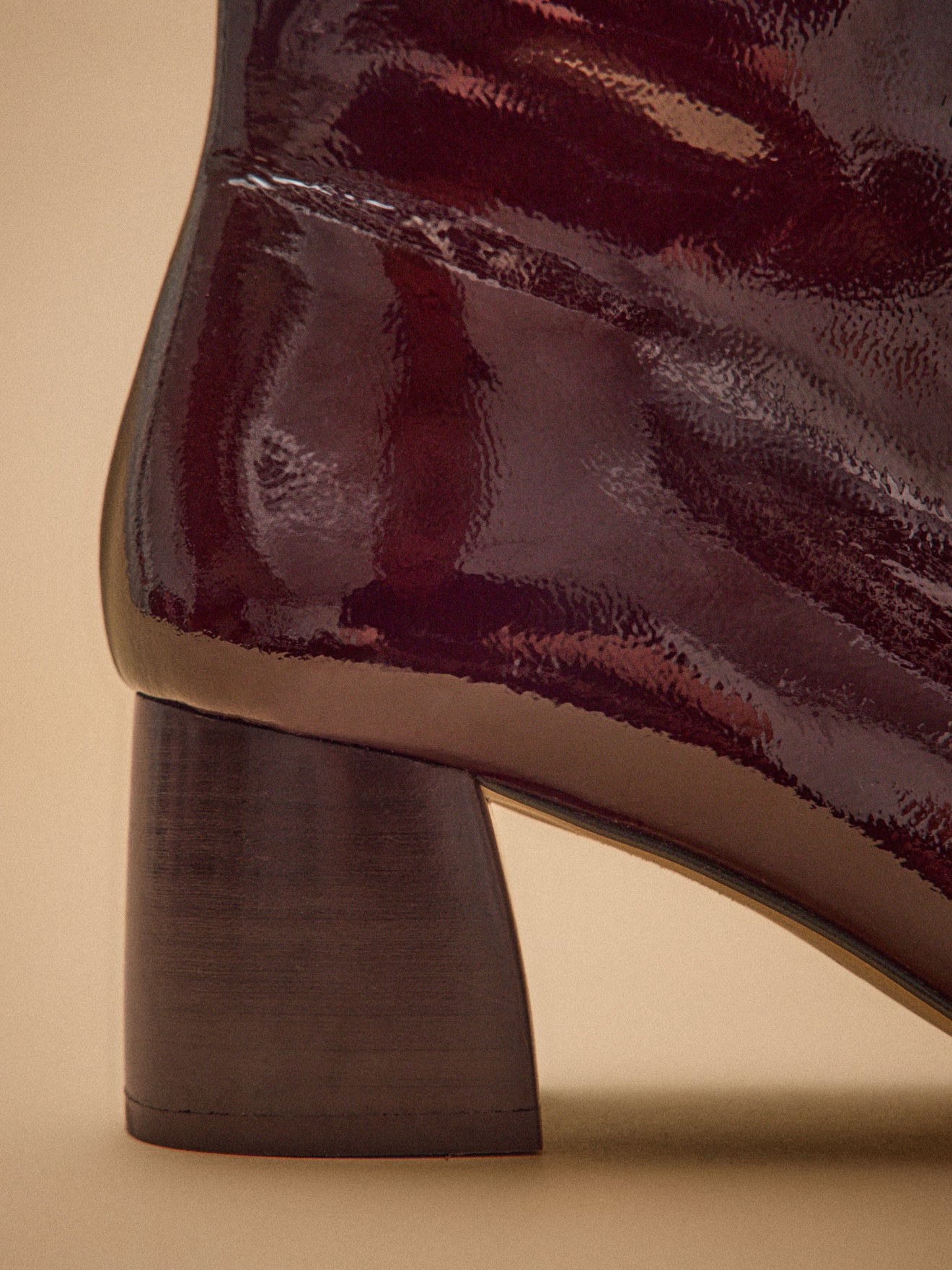 Boots à talon cuir vernis femme