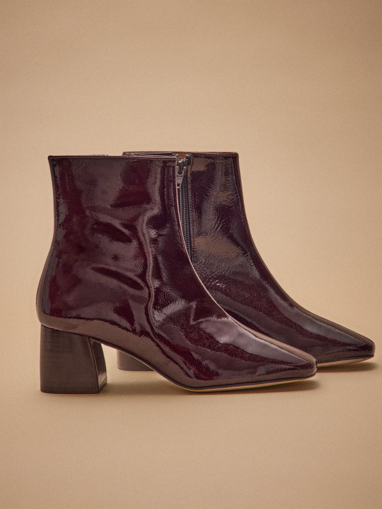 Boots à talon cuir vernis femme