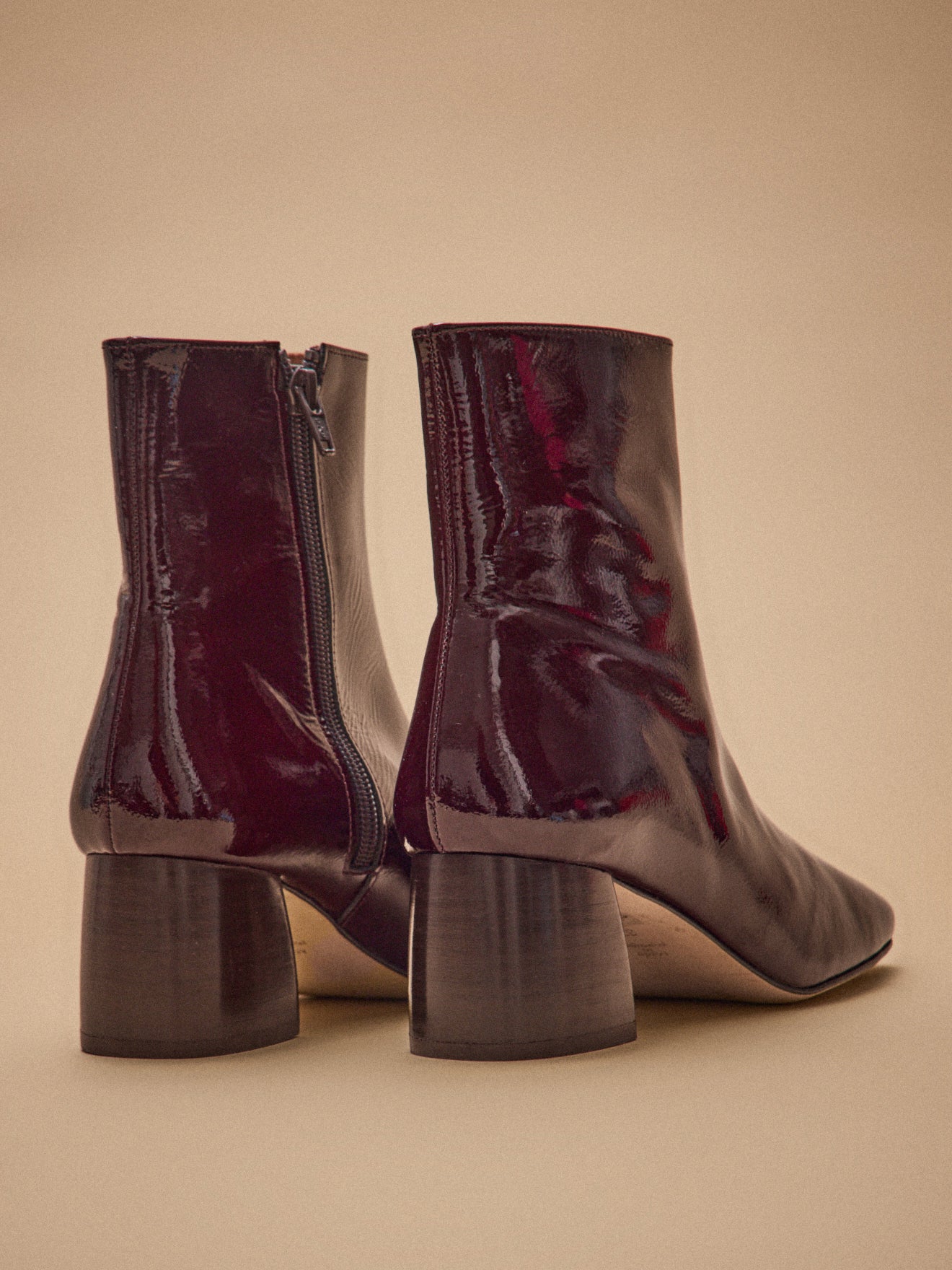 Boots à talon cuir vernis femme