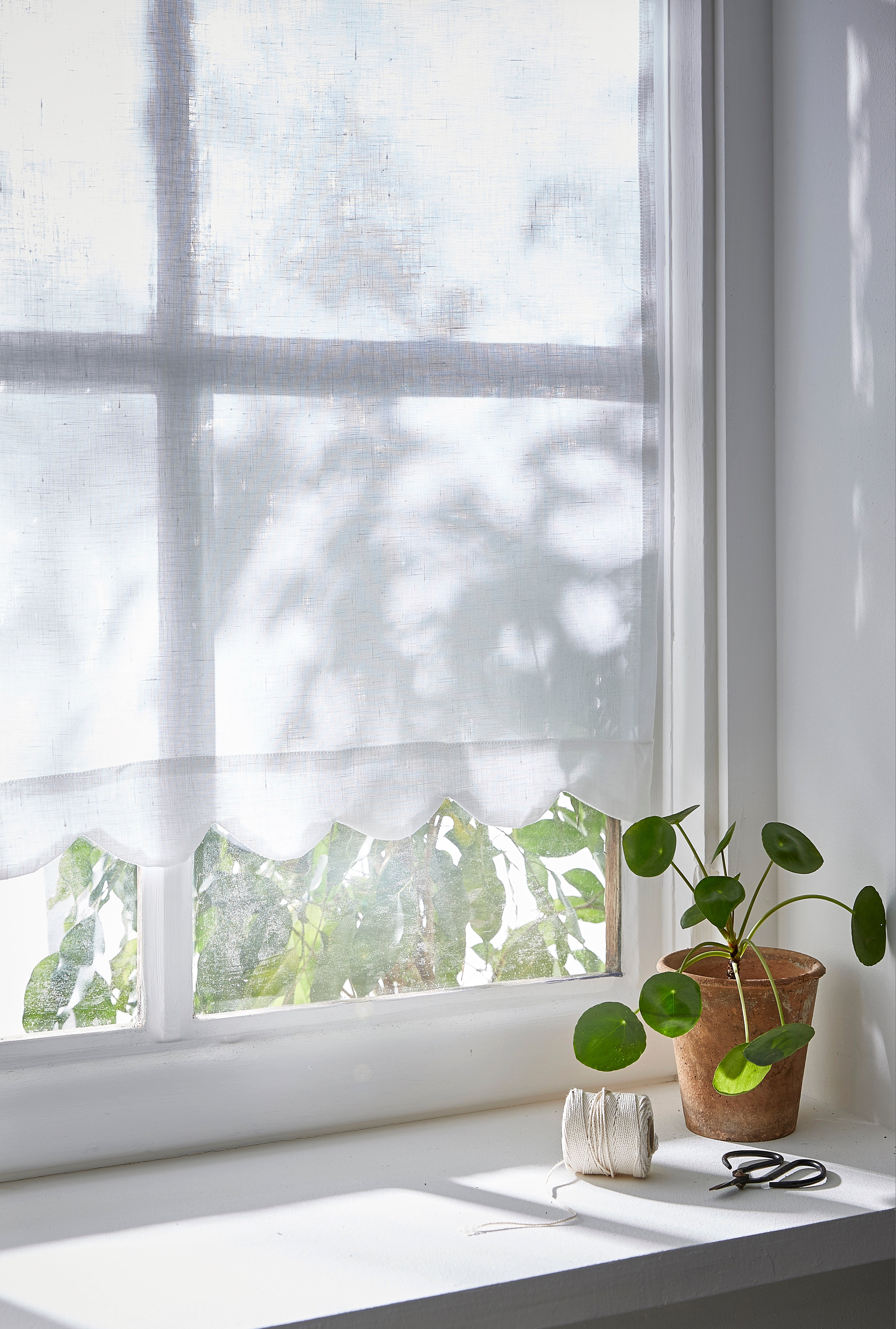 Brise-bise festonné en lin