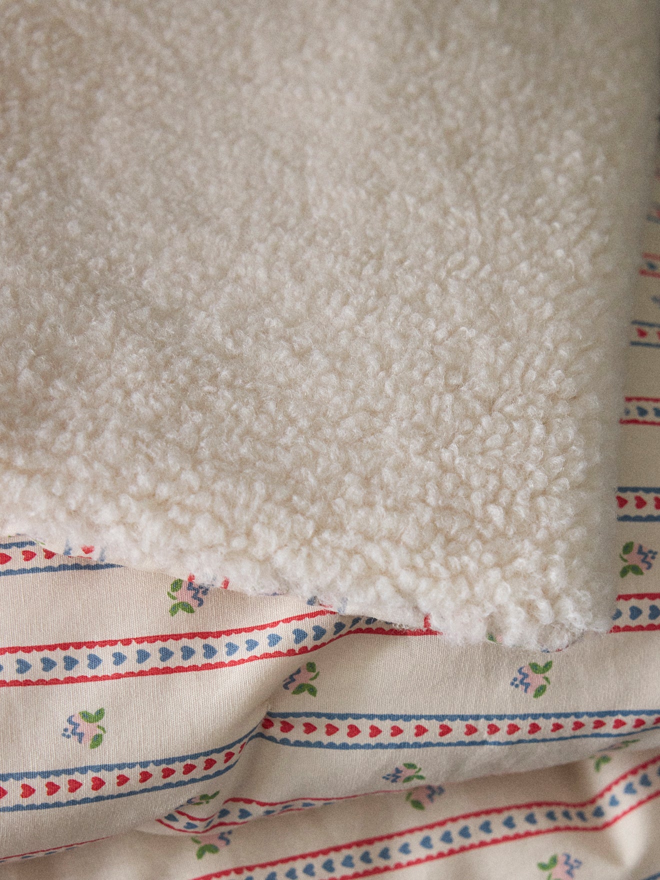 Plaid réversible sherpa et imprimé Avril