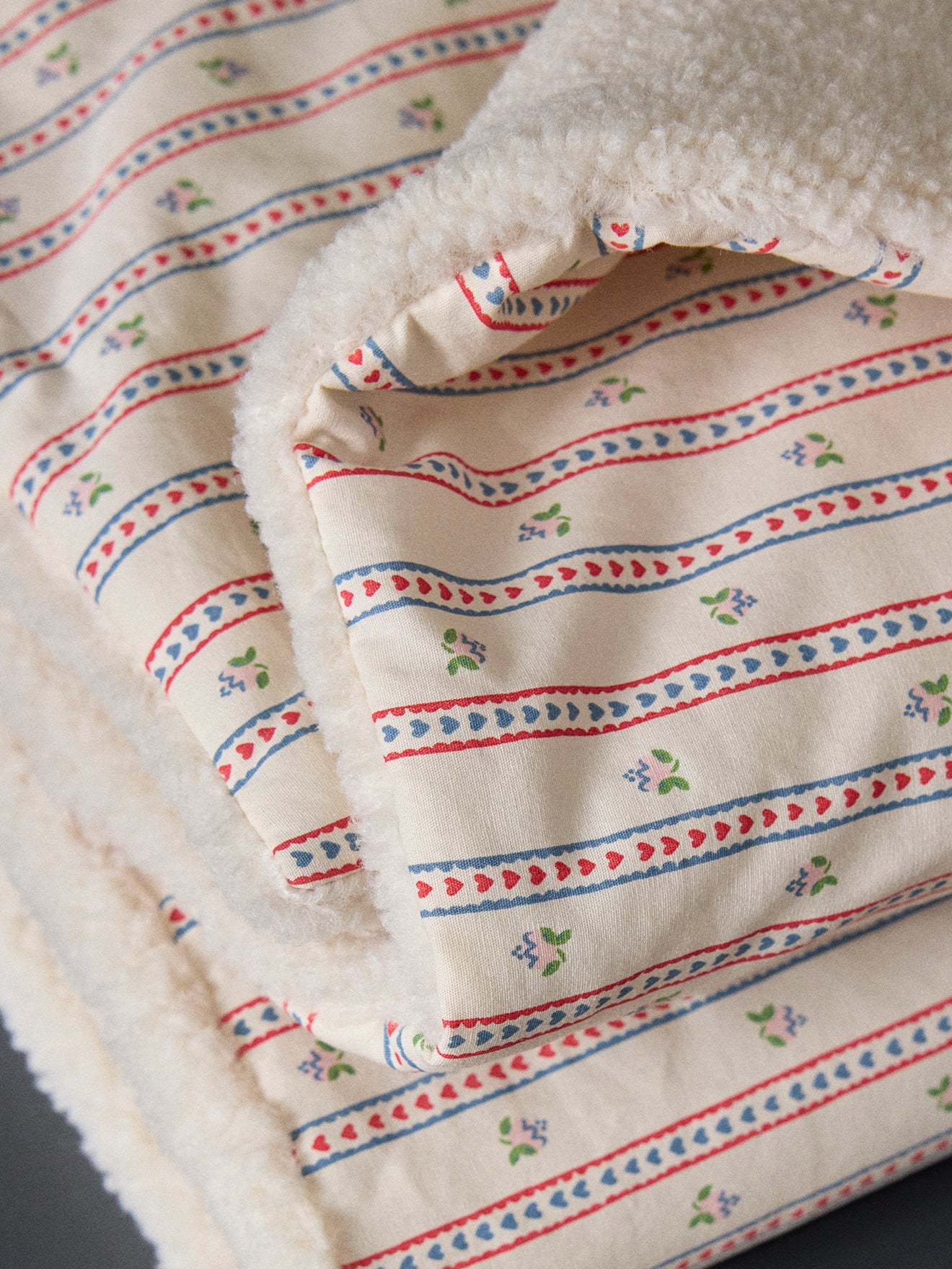 Plaid réversible sherpa et imprimé Avril