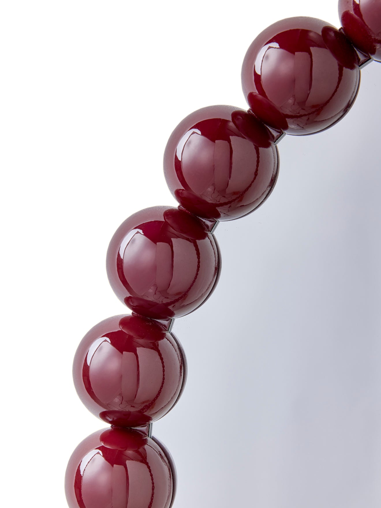 Runder Spiegel mit Rahmen aus Holzkugeln