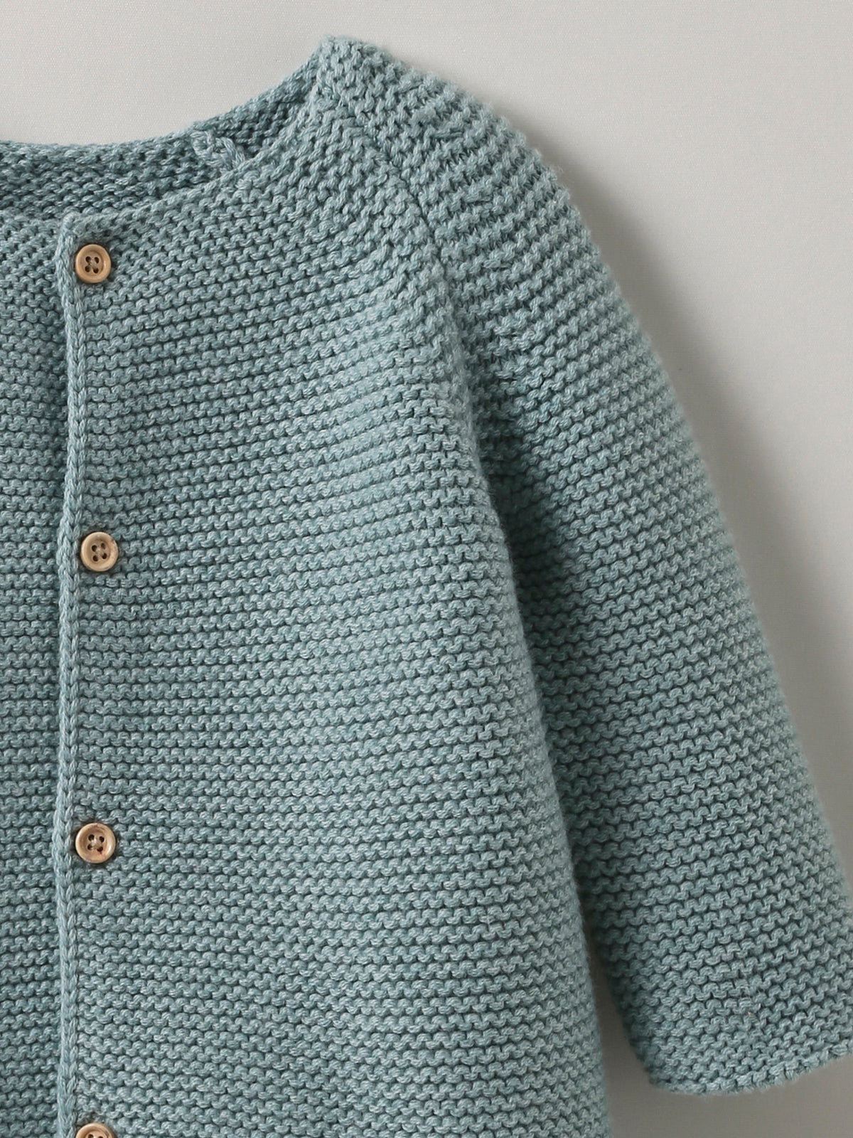 Baby-Strickjacke aus Wolle und Bio-Baumwolle