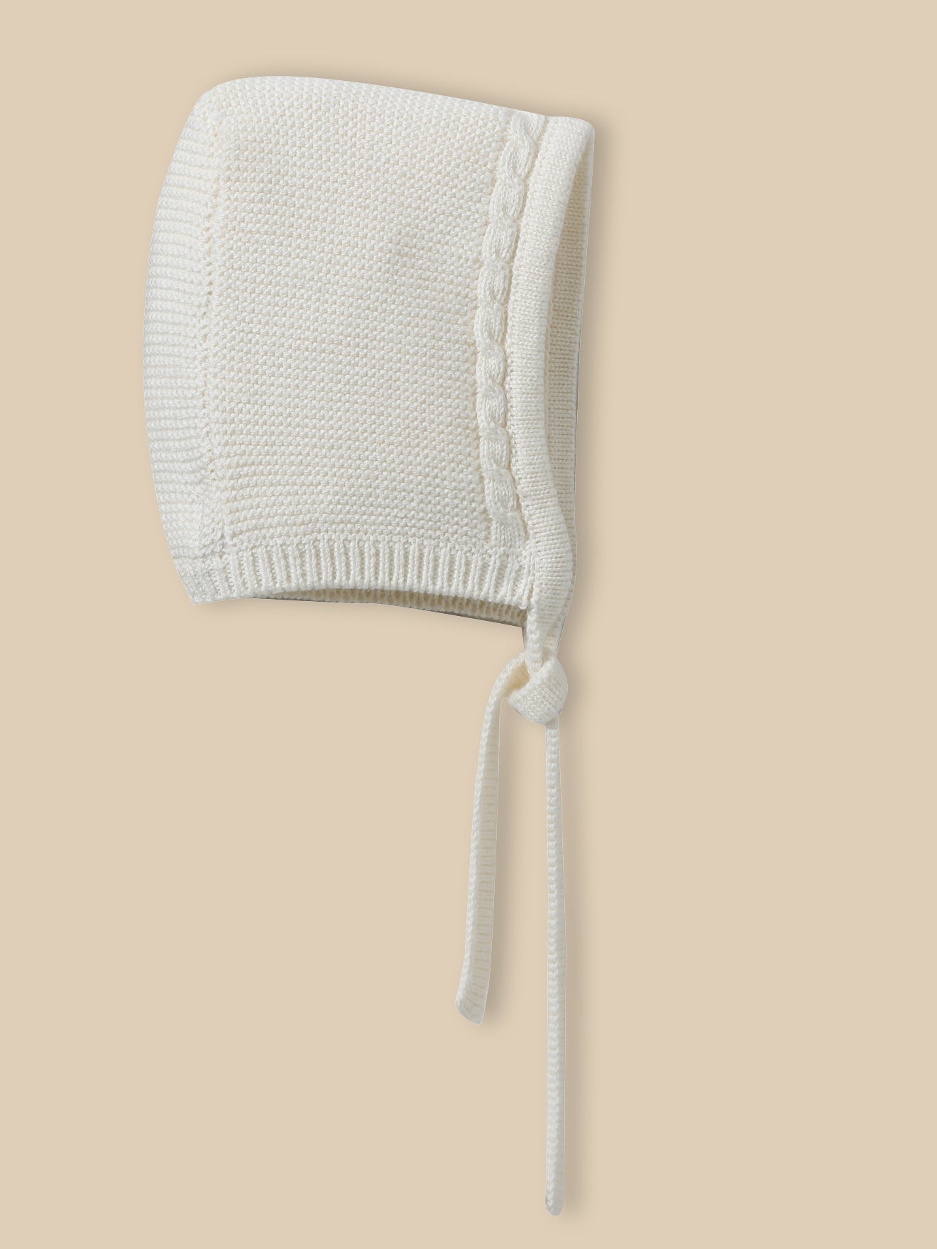 Béguin en point mousse Bébé