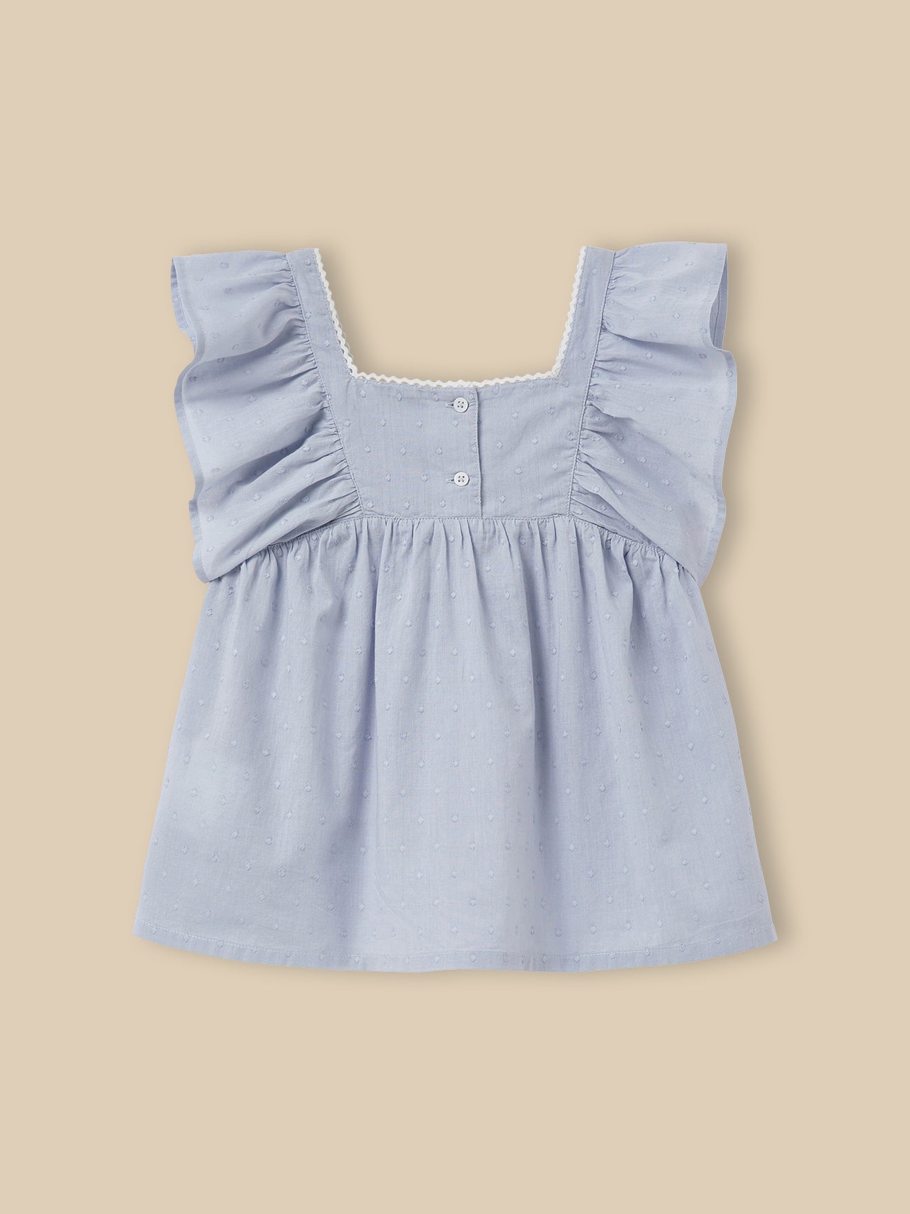 Mädchenbluse aus besticktem Tupfenmull