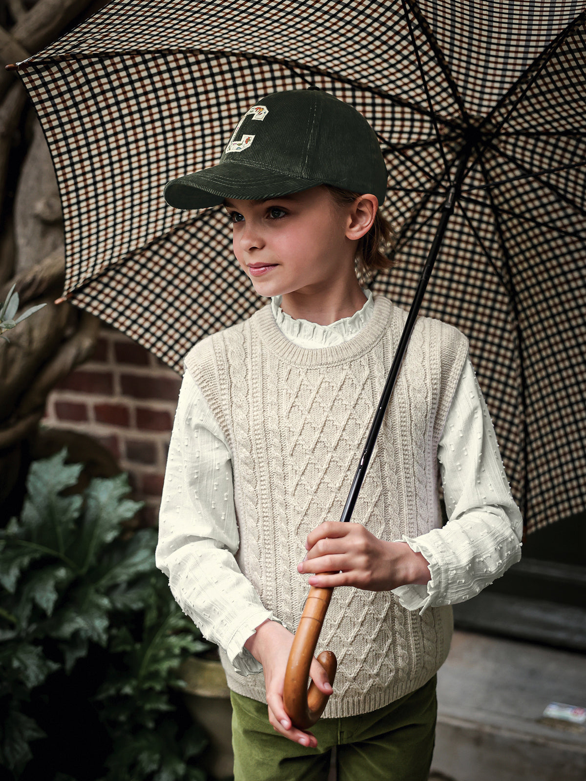 Pull torsadé fille sans manches